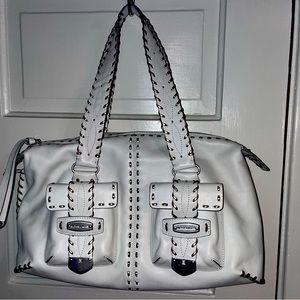 Bought this at an estate sale thought it was authentic but I don’t think it is.